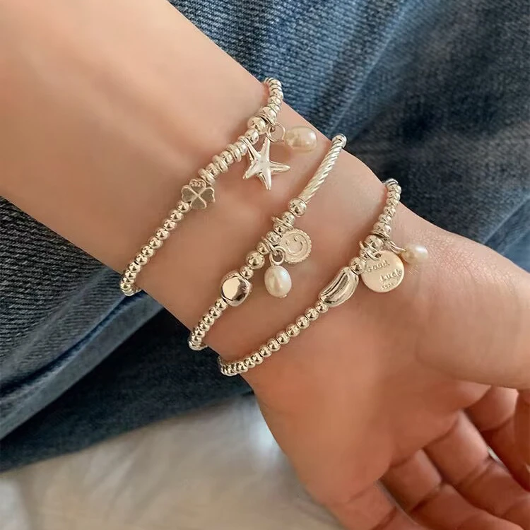 Lieferant von individuellem 925-Silberschmuck, modisches Armband, Stern-Armband